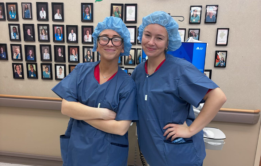 Two nursing students posing for a photo.