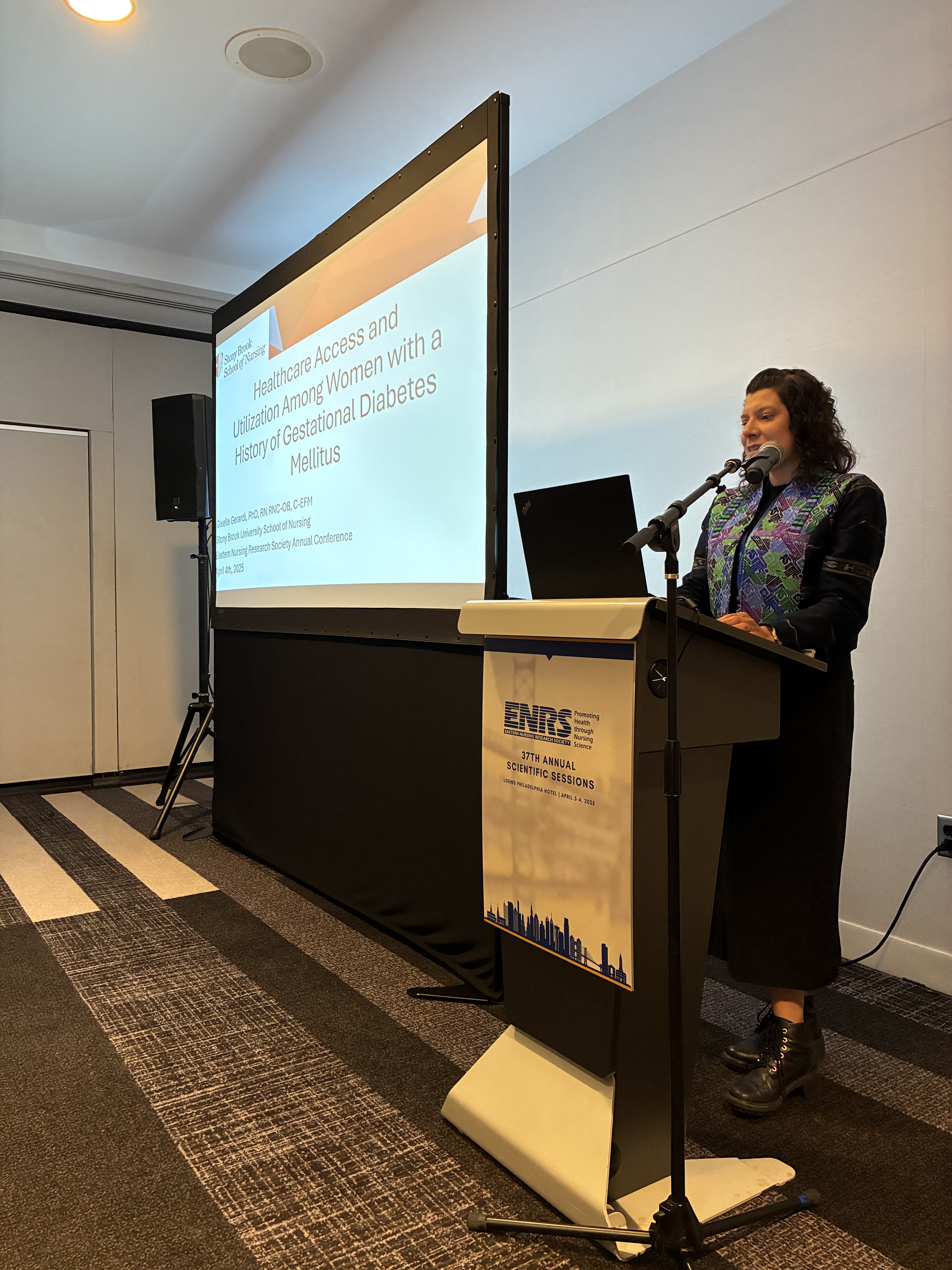 Dr. Giselle Gerardi presenting her podium on Healthcare Access and Utilization Among Women with a History of Gestational Diabetes Mellitus
