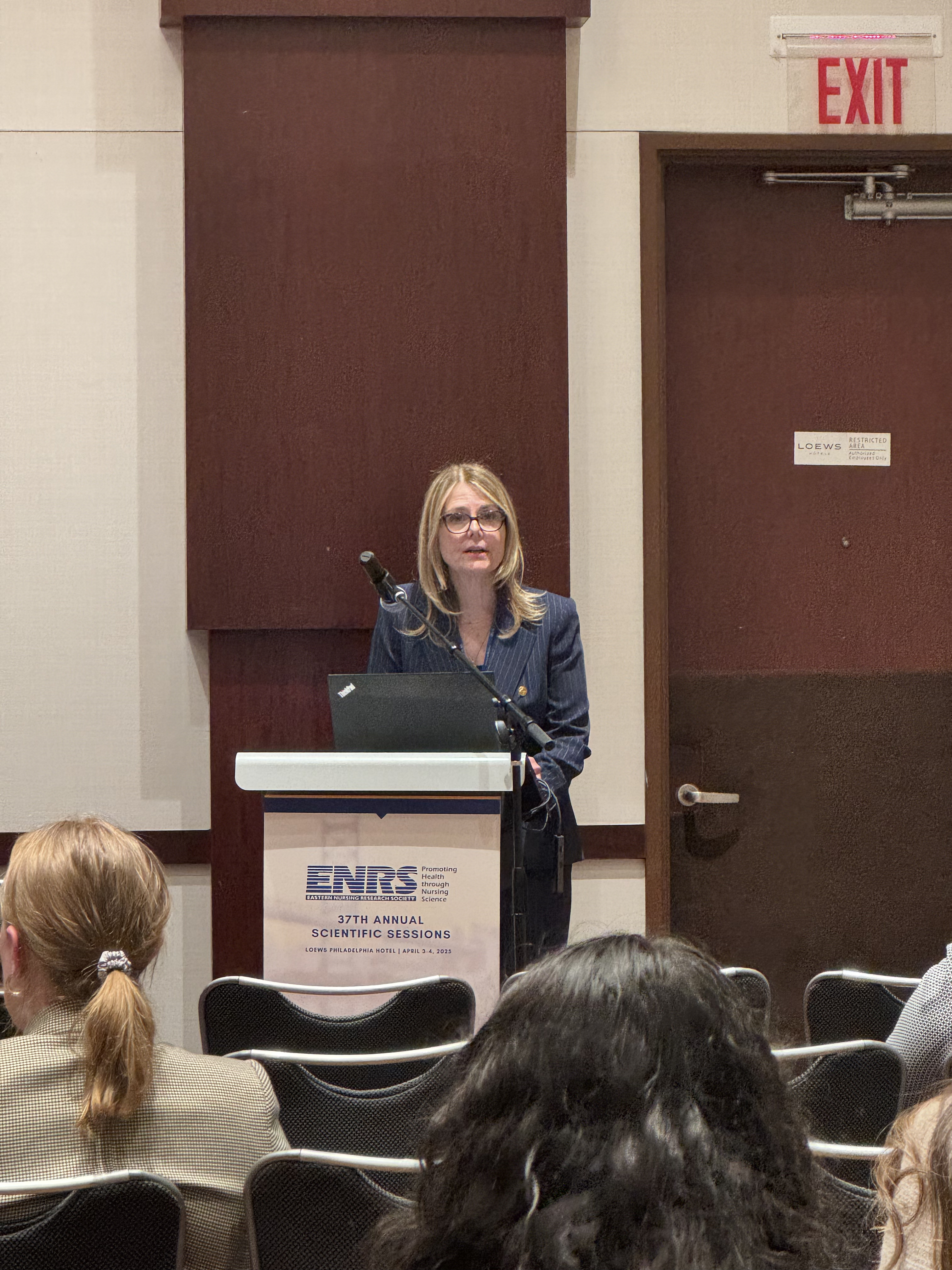 Dr. Ann–Margaret Navarra presenting her podium on Efficacy of the Adherence Connection for Counseling, Education, and Support (ACCESS)–II Randomized Controlled Trial (RCT) on 24–  week Adherence and Viral Load Outcomes among HIV+ Adolescents and Young Adults